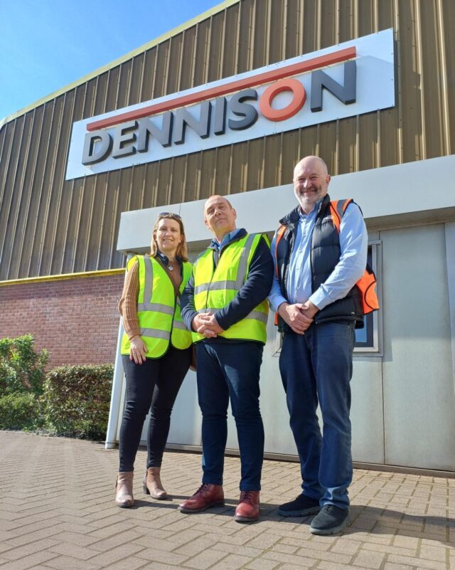 Collease team standing in front of the dennison building